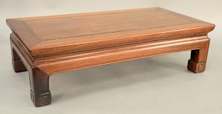 Small hardwood low table/footrest, China, 20th century. height 6 inches, top: 11" x 22".