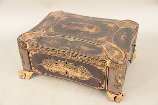 Chinese black lacquered sewing box, chinoiserie decorated with landscape and figures opening to fitted interior over one drawer on carved gilt bat or 