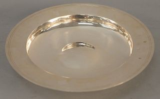 English silver basin, plain form with push up center and plain edge, diameter 13 1/2 inches, 48.8 troy ounces. Provenance: An Estate from 5th Avenue, 