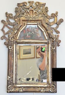 Large courting type mirror having gilt open work over three dimensional painting over mirror, late 18th century early 19th century, Continental. 37" x