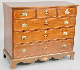 Mahogany three over three drawer chest, on bracket feet, drawers with urn inlays, 19th century. height 39 3/4 inches, width 45 1/4 inches. Provenance: