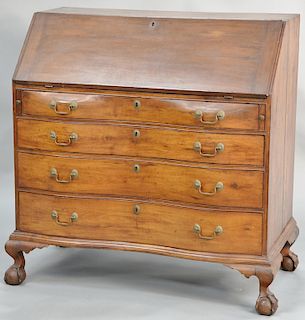 Chippendale cherry desk, having slant lid opening to reveal oval fan carved central drawer flanked by fluted columns and drawers over four graduated o