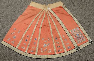 Chinese silk skirt, red ground embroidered with blue flowers. length 37 inches.