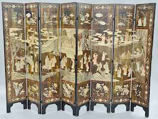 Chinese eight panel coromandel lacquered screen, depicting courtyard scene with scholars and boys playing on one side and on the opposite side scholar