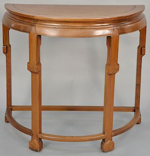 Demilune hardwood side table, China, 20th century, height: 35 inches, diameter: 37 inches.