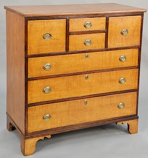 Chippendale chest having tiger maple drawer fronts set on cut out bracket base, circa 1780. height 42 1/2 inches, width 40 1/2 inches, depth 20 3/4 in
