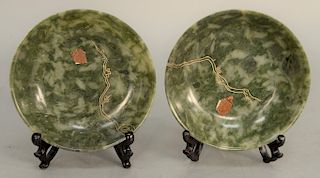 Pair of spinach green jade dishes, each having incised gilt branch decoration on both sides and a brown wax seal. diameter 5 inches. Provenance: An Es