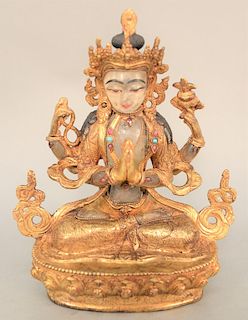 Chinese rock crystal and bronze deity, figure in seated position on lotus case having rock crystal lead, body, forearms and feet, bronze mounted with 