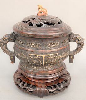 Fine bronze covered censer, China, probably Ming Dynasty, in the form of a classic Shang Kuei or banquet tureen, decorated with central gold taotie ma