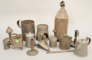 Large toleware lot, including candle molds, lantern, heart shaped strainer, push up candlestick, pots, foot warmer and molds. tallest 16 inches.