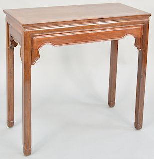 Hardwood rectangular side table, China 19th/20th century, in simple Ming style with solid undulating apron, height: 34 inches, top 17" x 35"