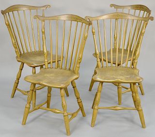 Set of four Windsor side chairs, having fan backs with carved ears and saddle seats set on turned legs in old paint and stenciling. height 37 inches, 
