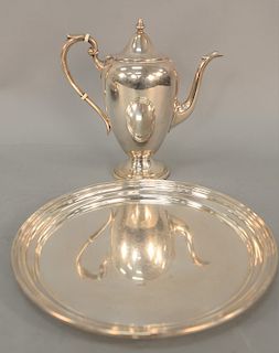 Two piece sterling silver lot, teapot and round tray by Alvin. 38.7 troy ounces. height 10 1/4 inches, diameter 12 inches. Provenance: Estate from Sut