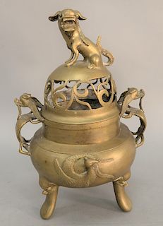 Bronze covered tripod censer, China, Late Qing, 19th/20th century, with zoomorphic handles and foo dog finial, six-character Ming Xuande Mark on the b