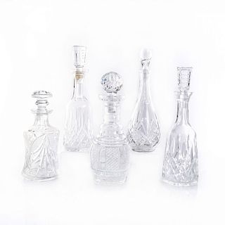 5 WATERFORD CRYSTAL DECANTERS AND TOPS