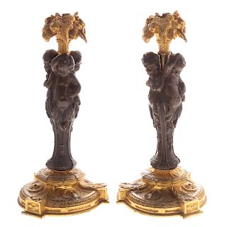 Pair of Napoleon III Bronze Figural Candlesticks