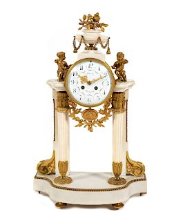 A Louis XVI Style Gilt Bronze Mounted Marble Mantel Clock