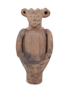 A Calabar Figural Earthenware Vessel
Height 18 inches.