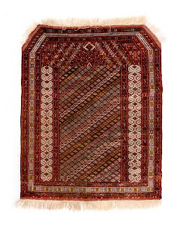 A Turkoman Wool Rug
4 feet 1 inch x 3 feet 4 1/2 inches. 