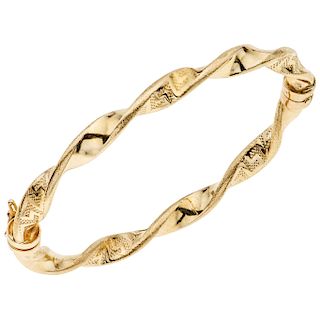 A yellow gold 14 K bracelet.