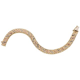 An Italian design yellow, white and pink gold 14K bracelet.