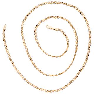 A yellow, white and pink gold 14 K necklace.
