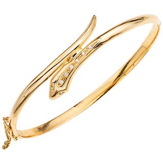 A yellow gold 18 K bracelet with simulants.