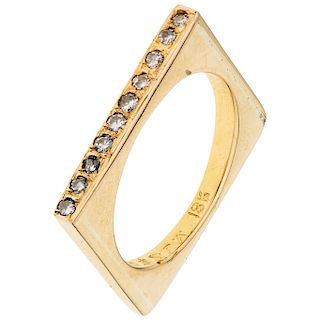 A yellow gold 18 K ring with diamonds.