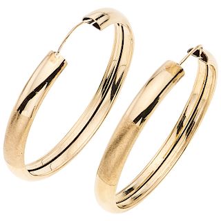 A yellow gold 14 K pair of hoops.
