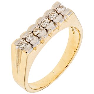 A yellow gold 14 K diamond ring.