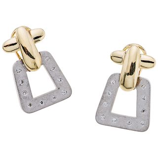 A white and yellow gold 14 K earrings with diamonds.