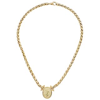 A yellow gold 14 K choker with cameo.