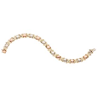 A yellow, white and pink gold 14 K bracelet.