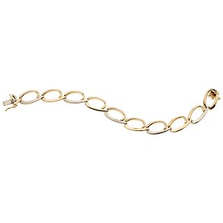 A yellow and white gold 14 K bracelet.