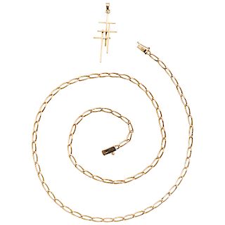 A yellow gold 14 K necklace and cross.