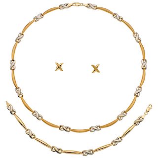 A yellow gold 14 K choker, bracelet and earrings set.