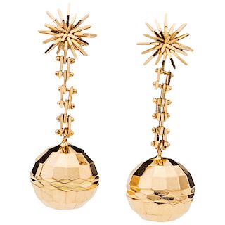 A yellow gold 18K and 14K pair of earrings.