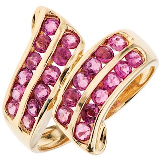 A yellow gold 14 K ring with rubies.