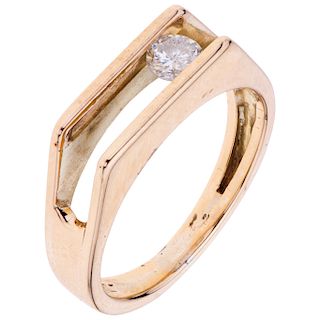 A yellow gold 14 K diamond ring.