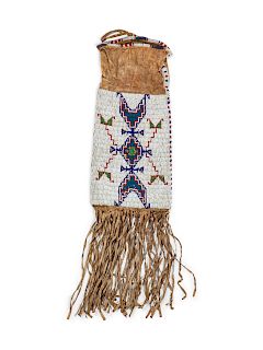 Sioux Beaded Hide Tobacco Bag
overall length 26 inches