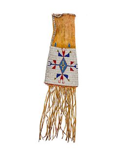 Sioux Beaded Hide Tobacco Bag
overall length 28 inches