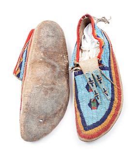 Sioux Beaded Buffalo Hide Moccasins
length 11 inches