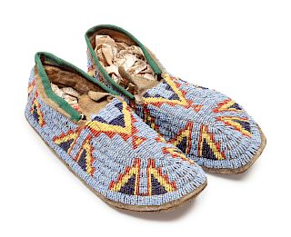 Sioux Beaded Hide Moccasins
length 10 1/4 inches