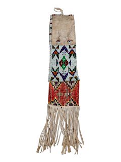 Sioux Beaded Hide Tobacco Bag
overall length 34 inches