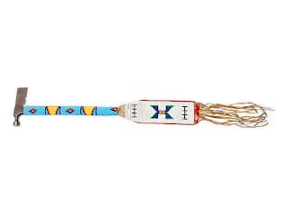 Plateau Beaded Tomahawk
overall length 41 inches