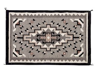 A Navajo Two Grey Hills Weaving
38 x 25 1/2 inches