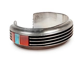 Victor Beck
(Dine, b. 1941)
Sterling silver cuff bracelet with coral and turquoise inlay