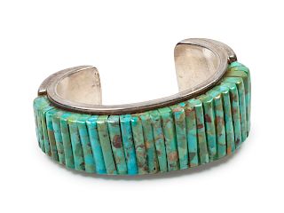 Pete Sierra
Dine, 20th Century
Sterling silver cuff bracelet with turquoise cobblestone inlay