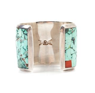 Sterling Silver, Turquoise, and Coral Bracelet with Hallmark (Artist Unknown)
length 5 1/4 x opening 1 x width 2 inches