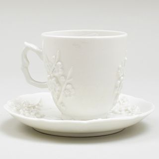 Bow White Glazed Porcelain Coffee Cup and Saucer with Applied Prunus Decoration